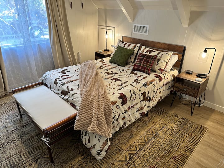 Bedroom on the  Top Floor (3rd flr.) has a Queen Sized Bed and an Internet connected TV.