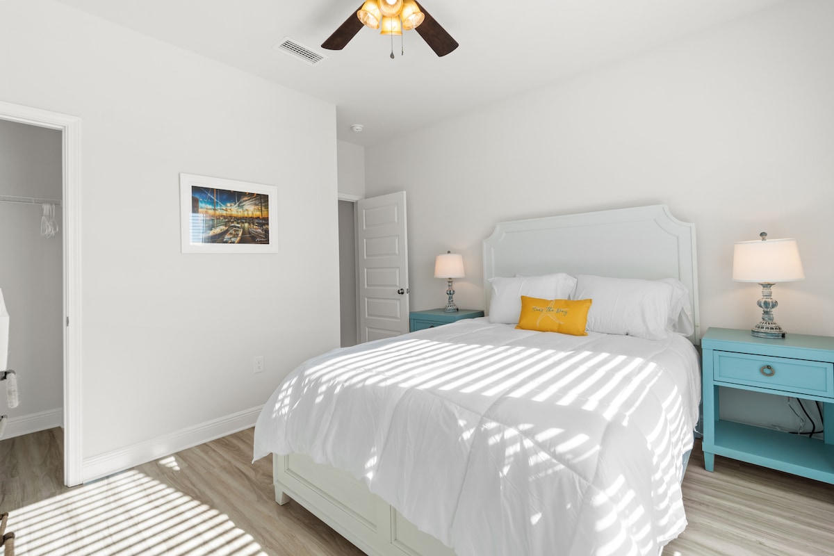 Simple and serene, this room offers comfort, privacy, and space to recharge after coastal adventures.