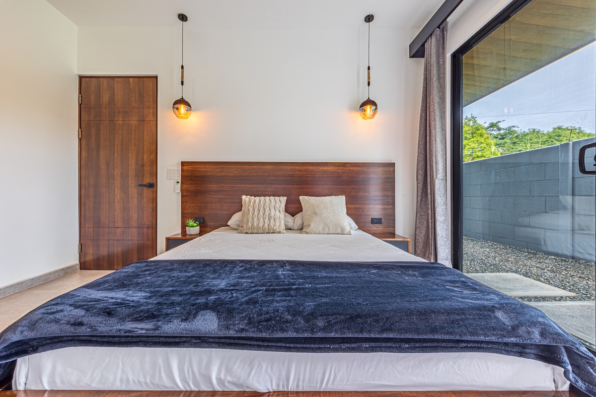 The third bedroom features a queen-size bed, dedicated A/C and closet