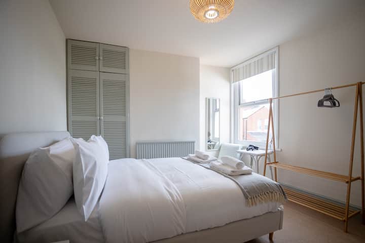 Quarto de casal com vista para o jardim