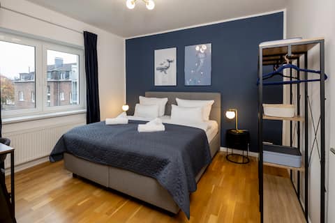 Design apartment with balcony, parking & top location
