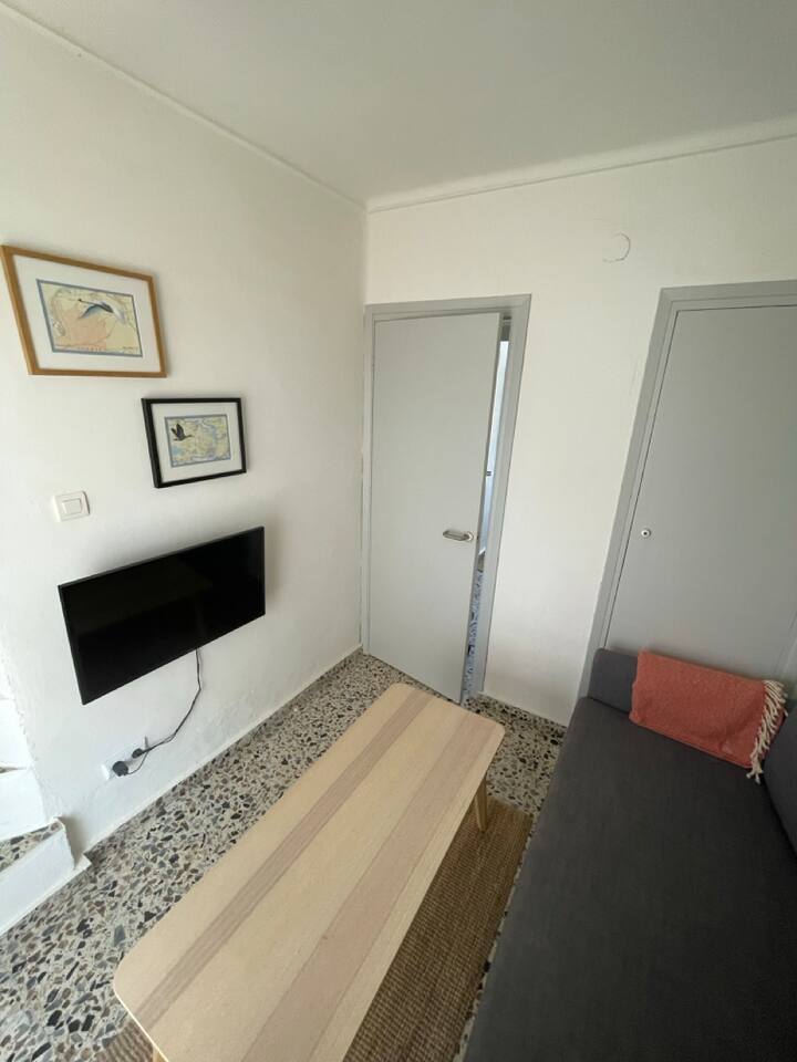 Sala de TV en la primera planta con sofá cama doble