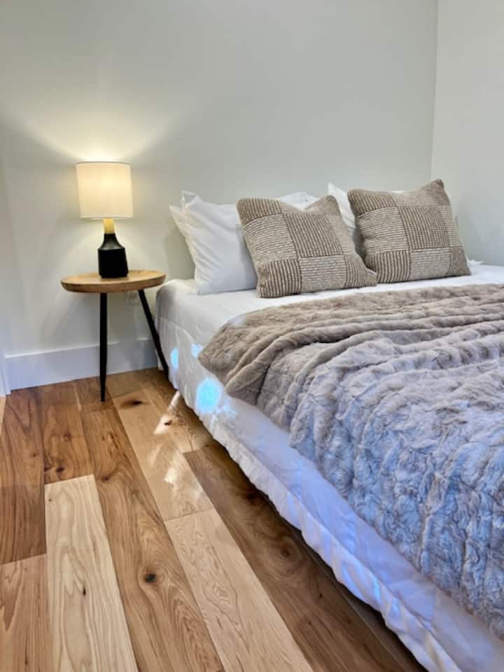 Snuggle into this cozy queen-sized bed.