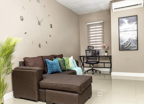 The Dwelling - Smart 2Bdr Condo near Int. Airport