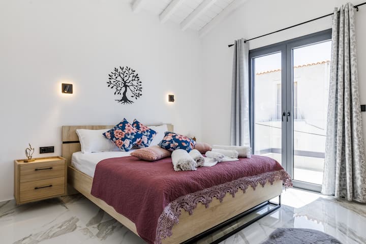 Chambre confortable pour des nuits reposantes sur l'île.