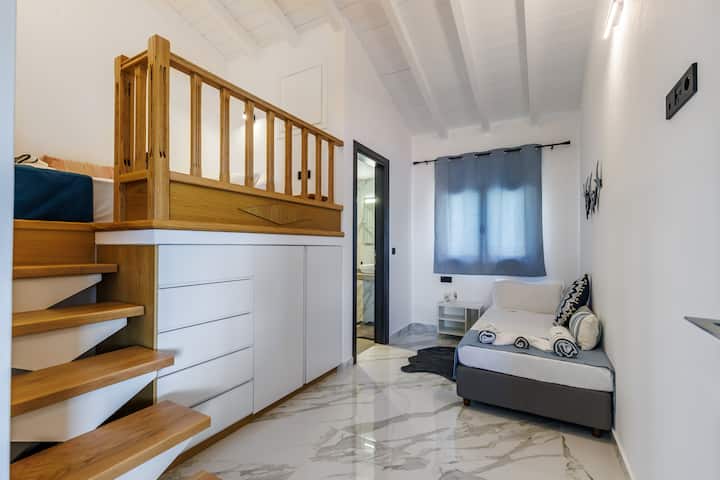 Espace de couchage calme après des journées complètes au bord de la mer.
