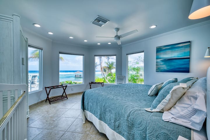 Oceanfront ensuite king bedroom with crib
