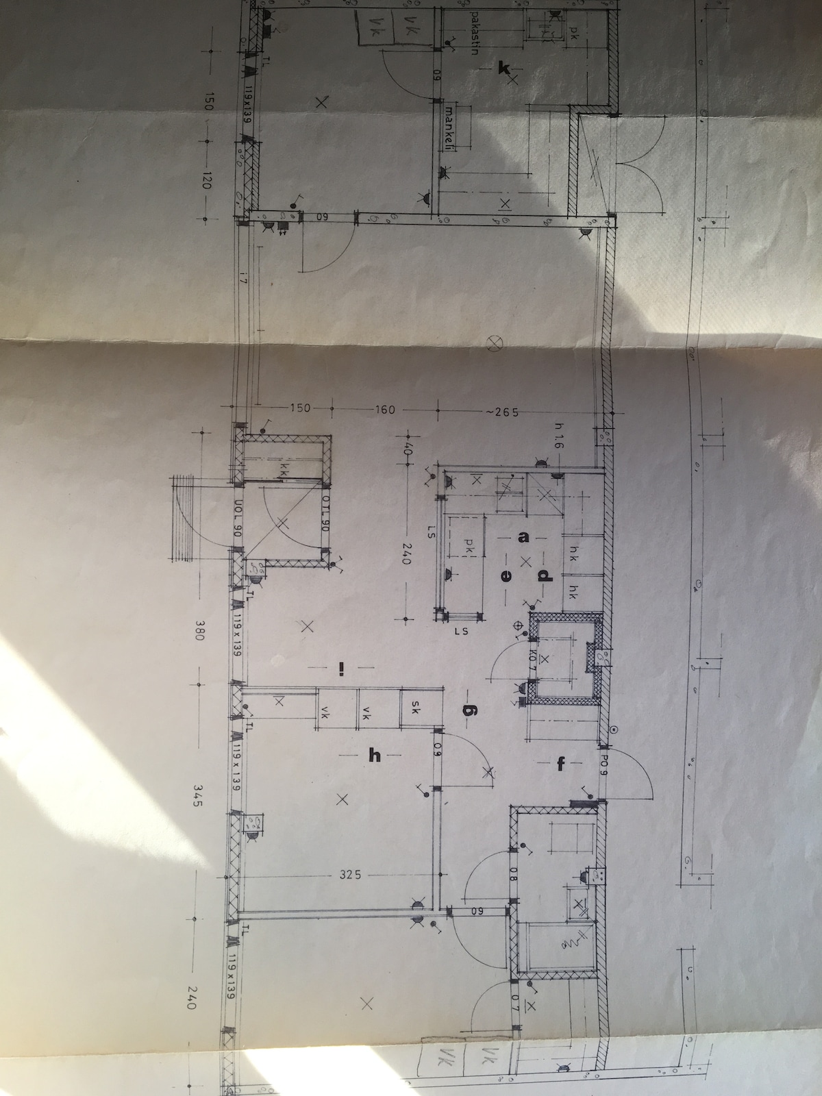 A floor plan layout displays the arrangement of rooms within the apartment. Distinct areas for bedrooms, living spaces, and bathrooms are outlined, with measurements noted for clarity. The design reflects a functional use of space, enhancing the understanding of the apartment's structure.