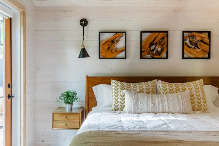 The king size bed, Helix mattress, 100% cotton Pottery Barn sheets, and blackout shades make for an exceptionally restful sleep.