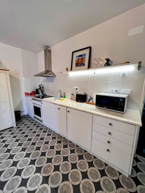 Popular Airbnb listing: Coastal Studio • Rooftop Ocean View • Beach • Gym in Lourinhã