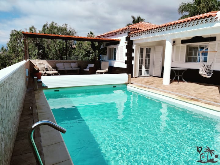 Heated pool with water cannon and Jacuzzi.