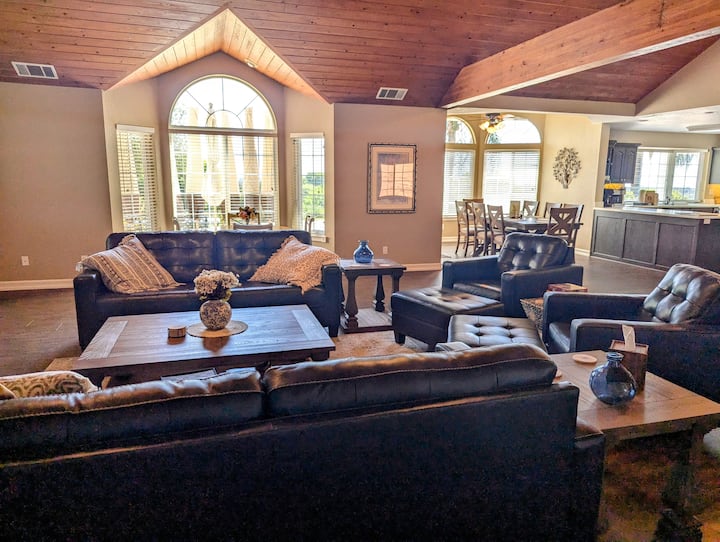 The gathering place! Seating with several tables and chairs and soft leather couches make it easy to visit whether in the kitchen, at the bar, or in the lodge. In all, dinner seating for 22 in the house (including six chairs in the dining room). 