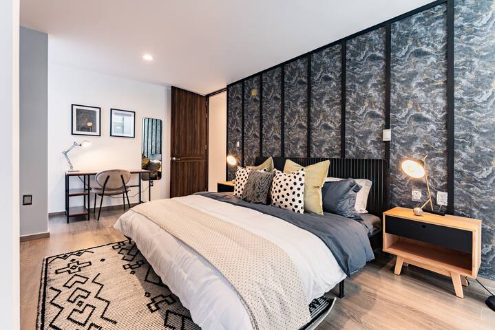 Urban Elegance Apartment with Balcony Views gallery image 3