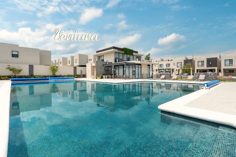 Warm apartment with pool, gym and fast WiFi |Zákia