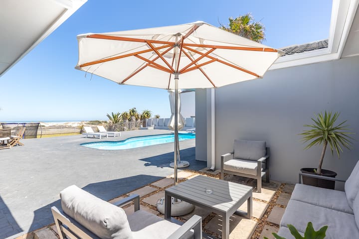 Beachfront Villa with Pool, Braai & 1-Min to Beach
