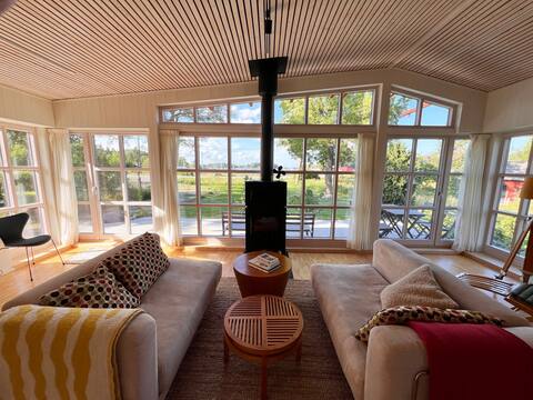 Panoramic view of Gräddöviken and own lake sauna