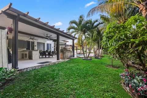 Palmetto Bay Tropical Home • Pool BBQ & Game Room