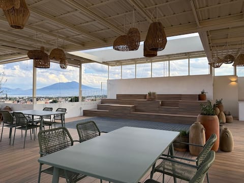 Casa Ana for 23: A Play Center with a Roof Garden