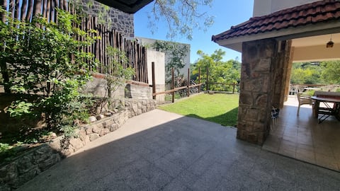 Family House in Cuesta Blanca with a path down to the river