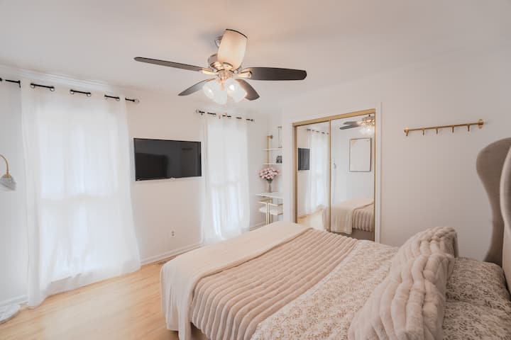 Queen Bed with 42" Smart TV.