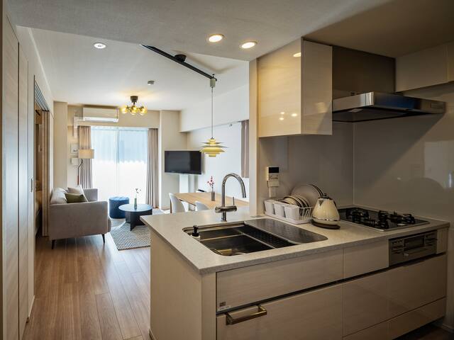 Shibuya Premier 2BR Apt 55sqm | Kitchen & Washer gallery image 2