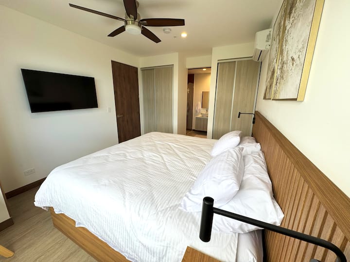 It has a king bed, smart tv and a/c.  