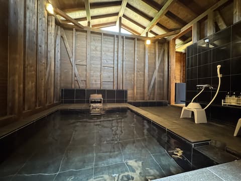 Newly built hinoki cypress log house with hot spring baths, open-air baths, and sauna, complete with