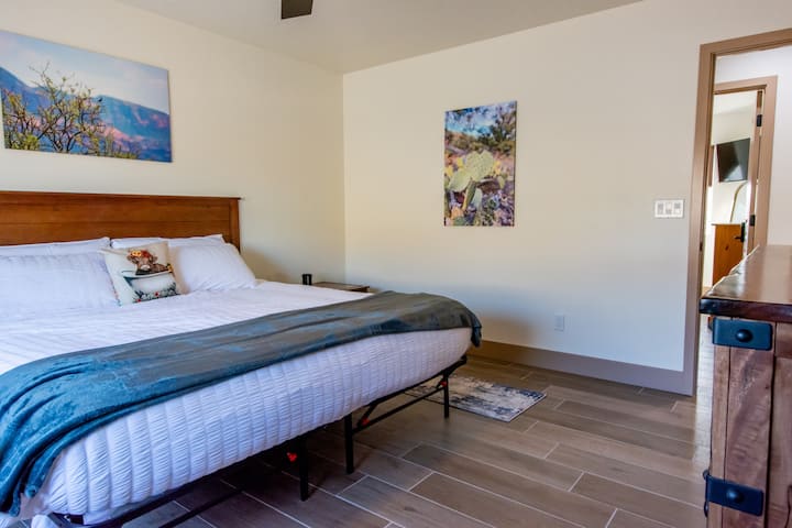 Master bedroom with local artwork