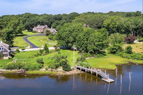 Iconic Estate Overlooking Cove with Water Access