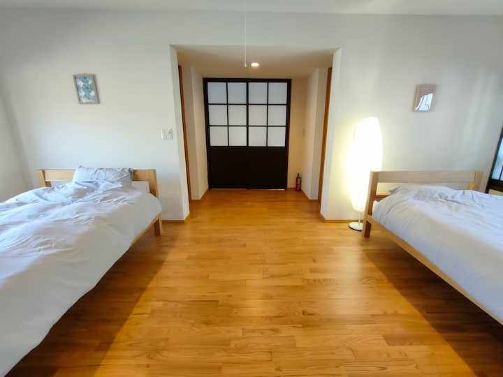 2 semi-double beds + futons make it comfortable for about 4 people
The door in the picture is the entrance to the bedroom and here is a lock for your privacy