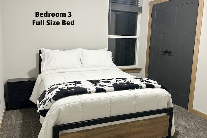 Full bedroom has a ceiling fan, along with a book to read. 
