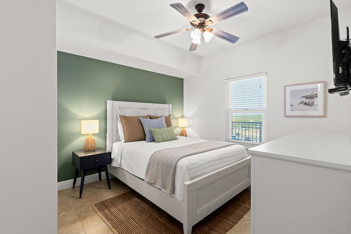 [Bedroom #2] Queen with ceiling fan, smart Tv, & access door to guest bath