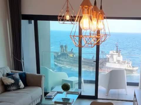 Luxury Oceanfront Retreat • Free Parking & Sunsets