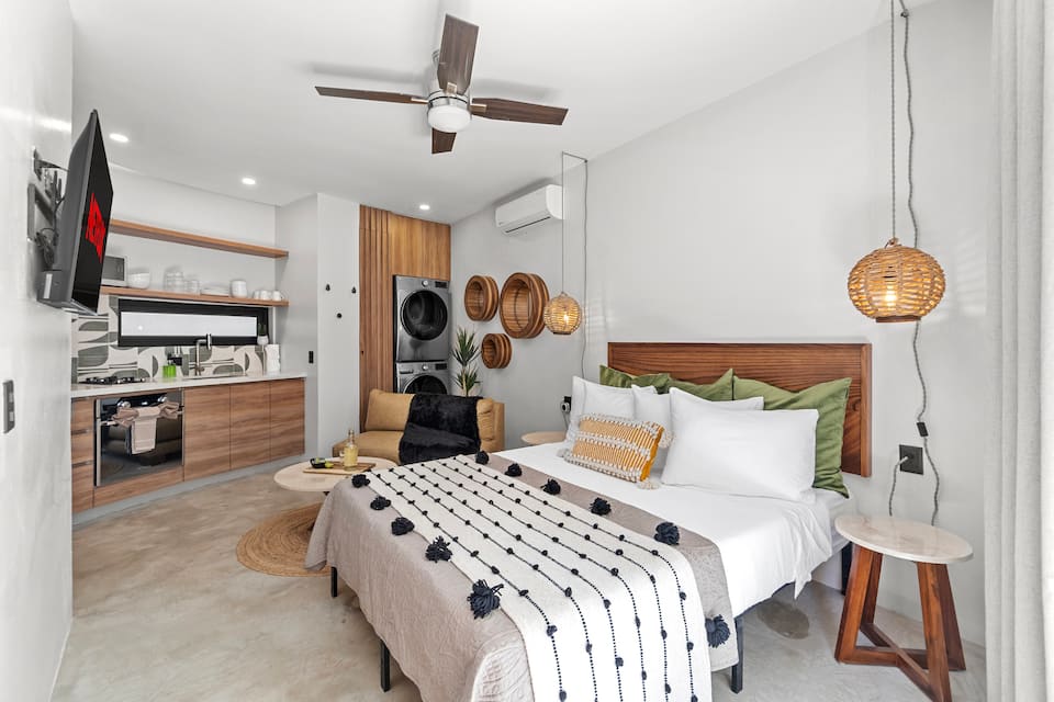 Convenient and Stylish Laundry Space with Full Kitchen: This brand new studio condo in Sayulita features a well-appointed laundry area and a fully equipped kitchen. The welcoming ambiance and comfortable bed ensure a relaxing and enjoyable stay.