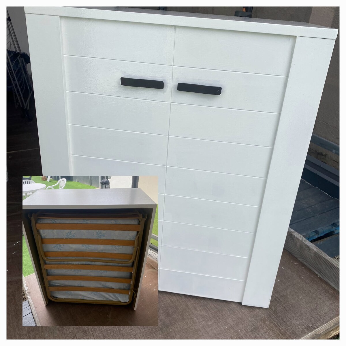 A white storage unit with a smooth, flat top and two horizontal handles is displayed. An inset image shows a folded mattress on a rack, featuring multiple layers for bedding purposes. The overall design is modern and functional.