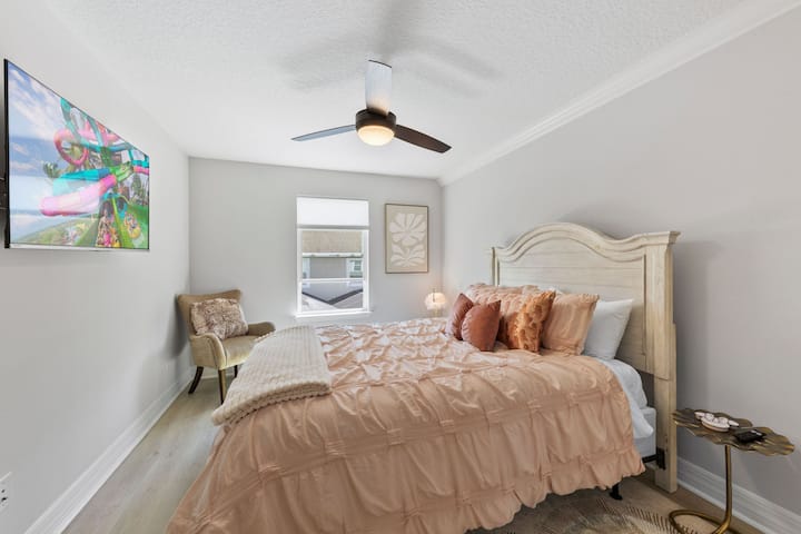 This Princess Suite is tastefully accented to remind you Disney is never too far far away. A queen sized bed with satin pillowcases, a  SmartTV, and it's own private bathroom make this a true escape!
