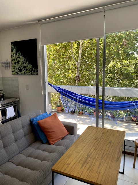 Top Airbnb: Tree House Luminous studio w great balcony in Palermo
