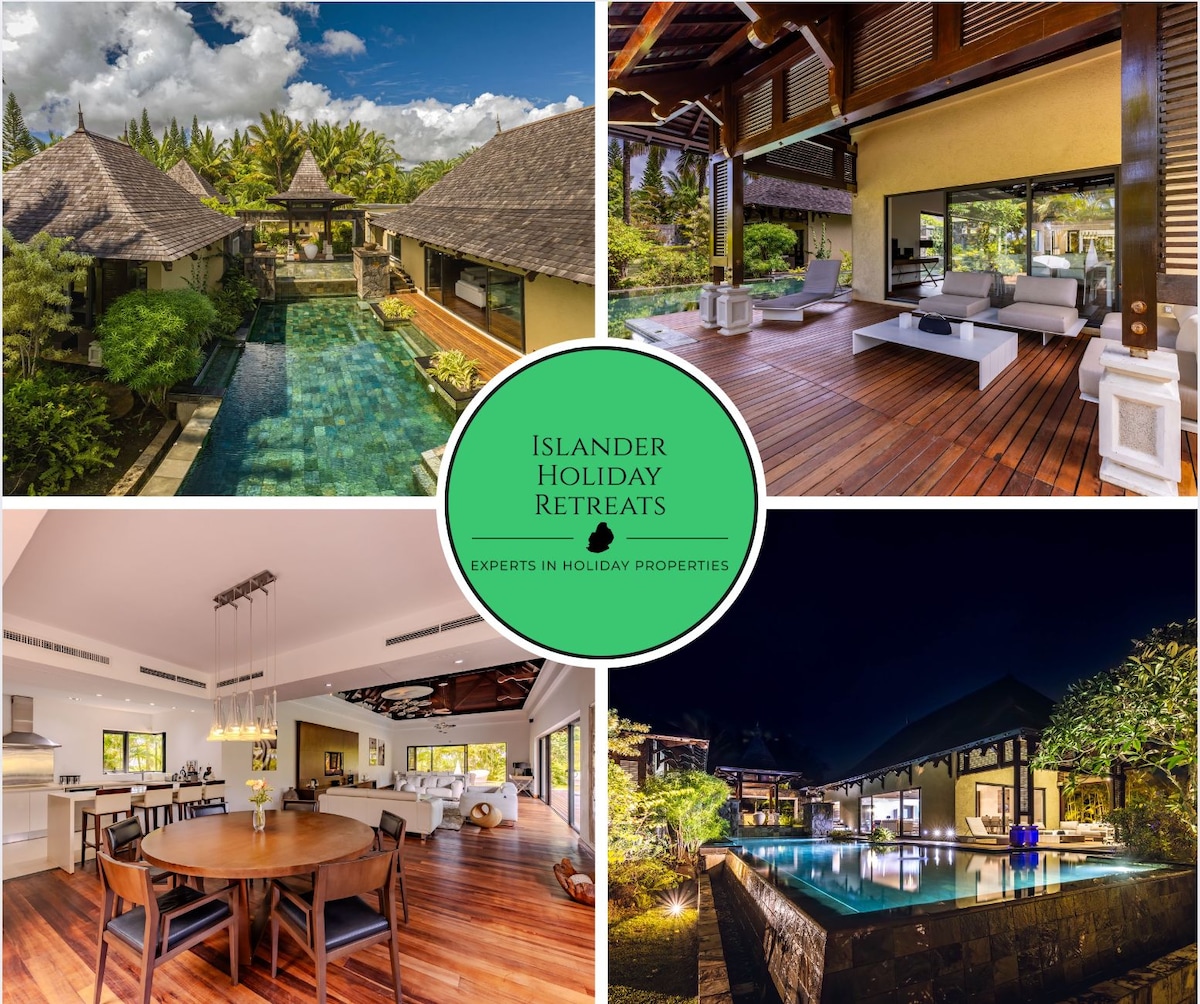 A tropical villa features a spacious outdoor living area with comfortable seating overlooking a serene swimming pool. Lush greenery surrounds the property, enhancing its natural charm. Indoors, an open-concept layout includes a dining area, modern kitchen, and elegant furnishings, illuminated by natural light.