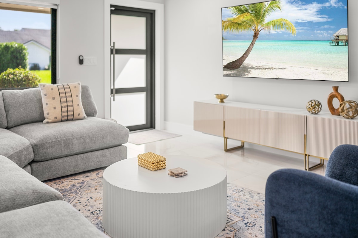 Newly remodeled home with clean white cool tile floors throughout.