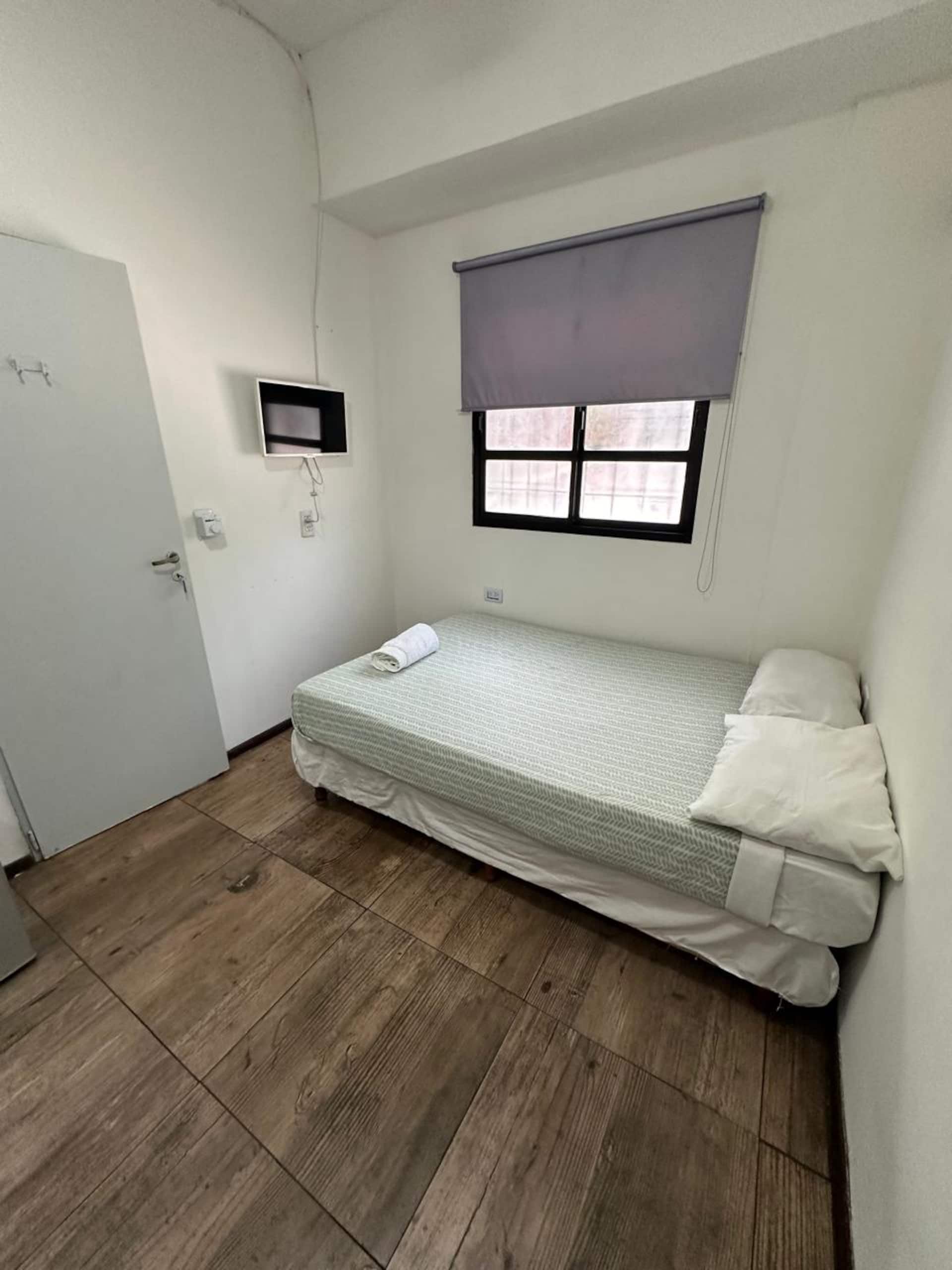 Quarto em coliving em Palermo com cama de casal