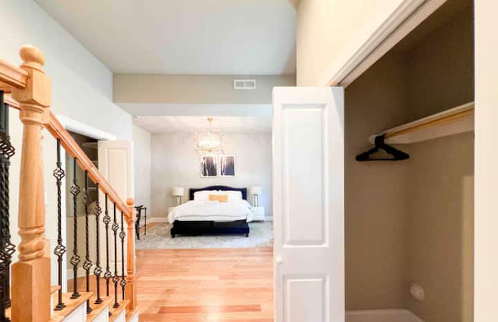 Primary bedroom located on the lower floor, ensuite bath attached