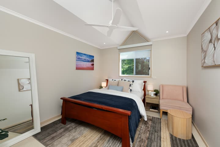 Bedroom facing the Golf Course. 
This room has a comfortable Ecosa Mattress Queen Bed.