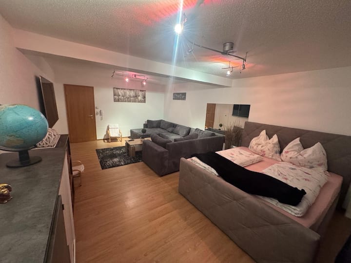 Chambre avec salon