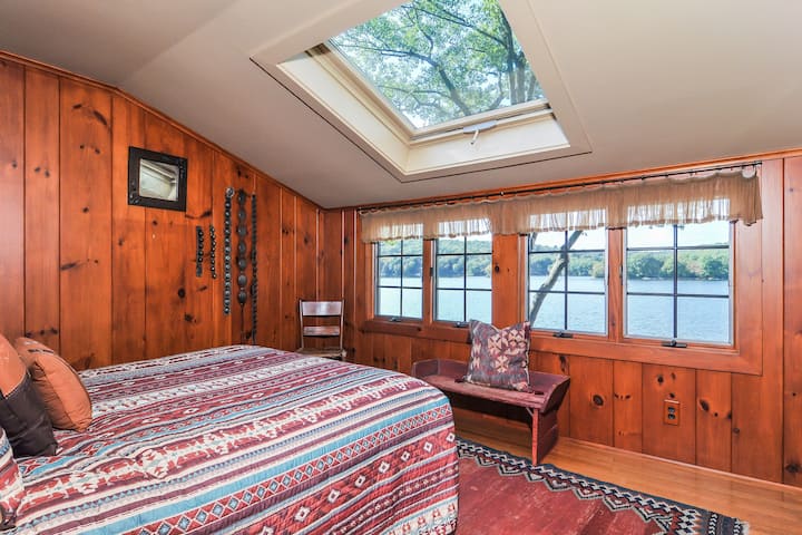 Main House Queen Bedroom with Gorgeous Views of the Lake off Library room adjacent to a full bathroom