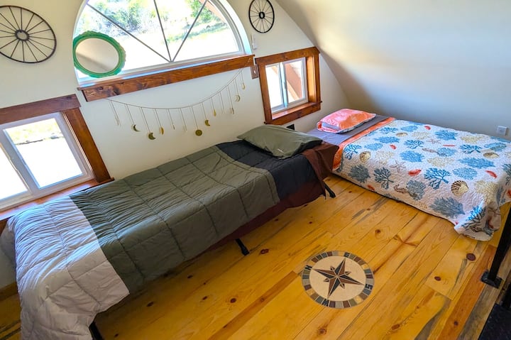 You. have a choice of a standard 38x75 inch twin bed or, if you're tall, try the Teton XXL cot with a Teton sleeping pads. The XXL  sleeping area is  35..5 inches x 80 inches.  (1 bed, 1 cot, no hammocks!)