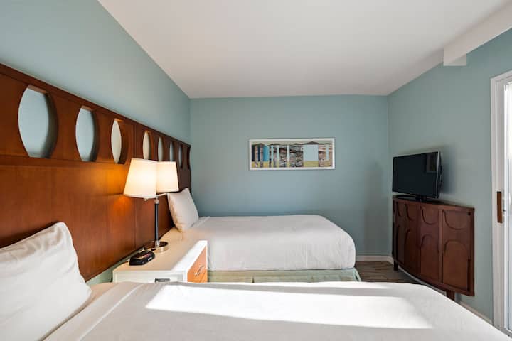 Tercer dormitorio con dos camas individuales en el segundo apartamento 