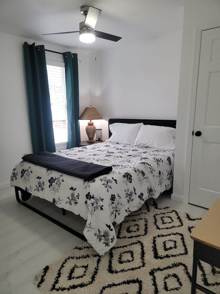 First bedroom on Second Floor with Youghiogheny River view.  Queen size bed with a Purple mattress.  TV included. 