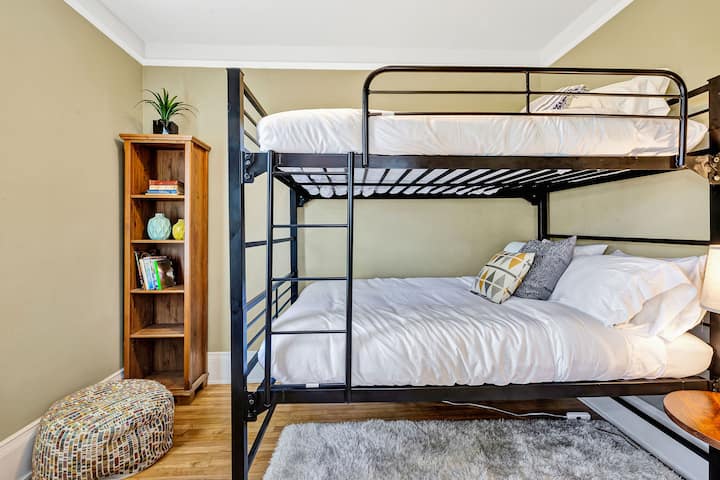 Comfortable group sleeping with multiple beds across this spacious Milwaukee home