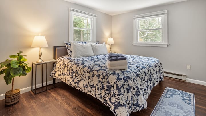 Follow your dreams, go back to Bed!
Upstairs Third Bedroom with King Bed: “Enjoy a restful night on this spacious king bed with soft pillows and luxurious bedding. A bright, tranquil space designed for comfort and relaxation. ☀️️”