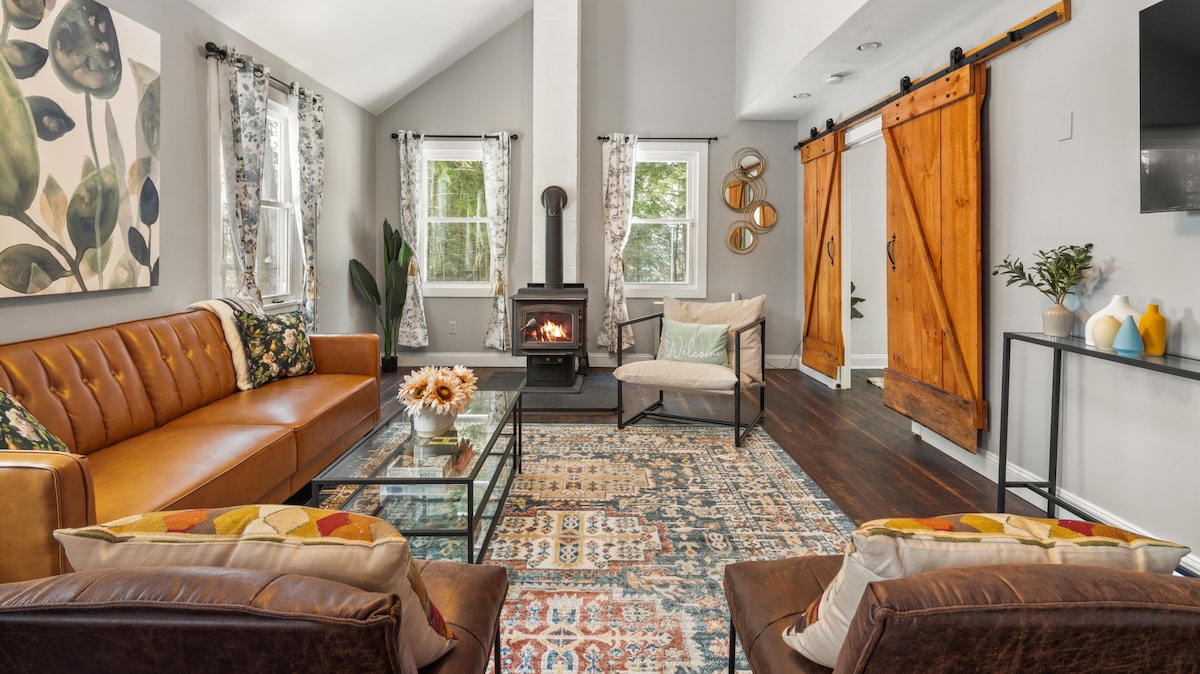Living Room: Bright and inviting space with elegant decor and a warm fireplace for relaxation!